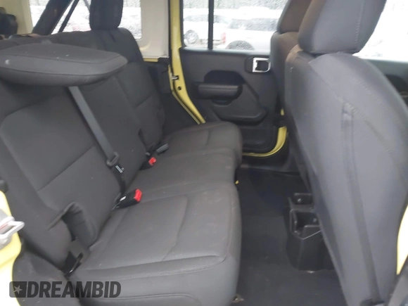 2023 Jeep Wrangler Sport with VIN 1C4HJXDG9PW631109, listed as a IAAI auction lot 41149861 with 27,570 mi miles and . Bid and sale history available at DreamBid. Image 8.