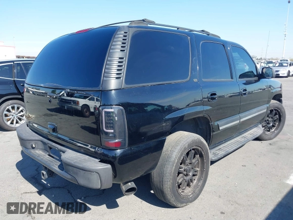 2004 Chevrolet Tahoe LS with VIN 1GNEC13T94J331286, listed as a IAAI auction lot 40691697 with 211,544 mi miles. Bid and sale history available at carsss.com. Image 4.