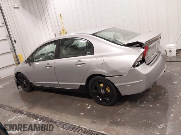 2009 Honda Civic LX z VIN 2HGFA16559H320179, wystawiony jako IAAI lot #41793459 z przebiegiem 172 878 mil mil oraz . Historia ofert i sprzedaży dostępna na DreamBid. Obrazek 14.