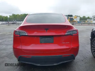 2021 Tesla Model Y Long Range with VIN 5YJYGDEE5MF085032, listed as a IAAI auction lot 41982925 with 64,541 mi miles and . Bid and sale history available at carsss.com. Image 16.