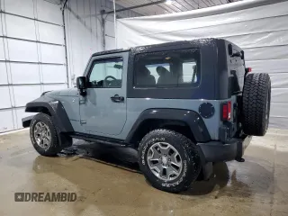 2014 Jeep Wrangler Sport with VIN 1C4AJWAG9EL322982, listed as a Copart auction lot 51145075 with 122,686 mi miles and Salvage Title. Bid and sale history available at DreamBid. Image 2.