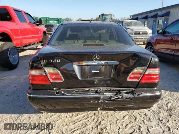 2002 Mercedes-Benz E-Class with VIN WDBJF65J32B494321, listed as a Copart auction lot 77557334 with 198,820 mi miles and Salvage Title. Bid and sale history available at carsss.com. Image 6.