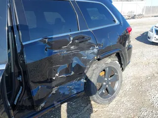 2015 Jeep Grand Cherokee Laredo with VIN 1C4RJFAG6FC171751, listed as a IAAI auction lot 41487935 with 134,113 mi miles. Bid and sale history available at carsss.com. Image 6.