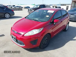 2012 Ford Fiesta SE z VIN 3FADP4EJ9CM140948, wystawiony jako IAAI lot #42301818 z przebiegiem 109 276 mil mil oraz . Historia ofert i sprzedaży dostępna na DreamBid. Obrazek 19.