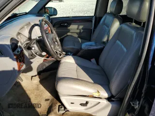 2008 GMC Envoy SLE2 with VIN 1GKDT13S882100069, listed as a Copart auction lot 77164634 with 206,709 mi miles and Salvage Title. Bid and sale history available at DreamBid. Image 7.