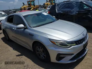 2019 Kia Optima LX z VIN 5XXGT4L31KG294125, wystawiony jako IAAI lot #42535638 z przebiegiem 117 722 mil mil oraz . Historia ofert i sprzedaży dostępna na DreamBid. Obrazek 1.