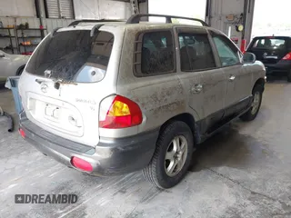 2003 Hyundai Santa Fe GLS z VIN KM8SC13D03U468114, wystawiony jako IAAI lot #42399443 z przebiegiem 185 851 mil mil oraz . Historia ofert i sprzedaży dostępna na DreamBid. Obrazek 4.