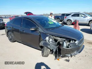 2016 Ford Focus SE with VIN 1FADP3F21GL262907, listed as a IAAI auction lot 41657582 with 62,789 mi miles. Bid and sale history available at carsss.com. Image 1.