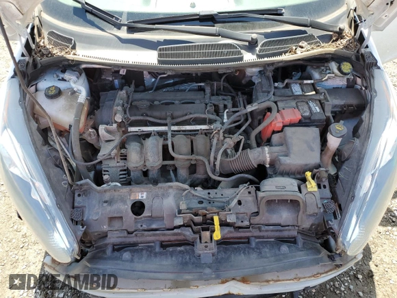 2018 Ford Fiesta SE z VIN 3FADP4BJ7JM114172, wystawiony jako Copart lot #54014805 z przebiegiem 66 828 mil mil oraz Szkoda całkowita • Salvage title. Historia ofert i sprzedaży dostępna na DreamBid. Obrazek 11.
