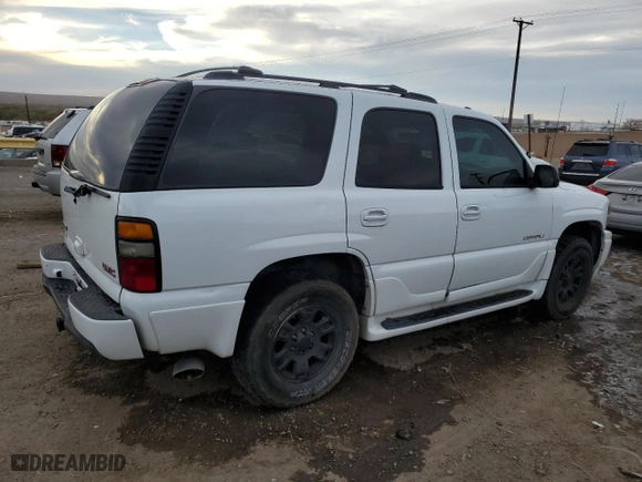 2004 GMC Yukon Denali with VIN 1GKEK63U84J270731, listed as a Copart auction lot 49094635 with 184,529 mi miles and Salvage Title. Bid and sale history available at carsss.com. Image 3.