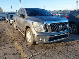 2017 Nissan Titan SV z VIN 1N6AA1E64HN509038, wystawiony jako IAAI lot #41771621 z przebiegiem 151 159 mil mil oraz . Historia ofert i sprzedaży dostępna na DreamBid. Obrazek 1.