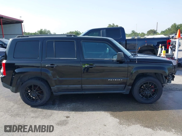 2013 Jeep Patriot Sport with VIN 1C4NJPBA0DD238009, listed as a IAAI auction lot 42301422 with 103,359 mi miles and . Bid and sale history available at DreamBid. Image 14.