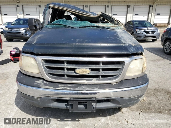 2000 Ford F-150 with VIN 2FTRX18W0YCA13563, listed as a Copart auction lot 55809785 with Not provided miles and Non repairable. Bid and sale history available at DreamBid. Image 5.