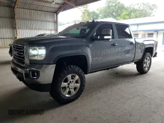2016 GMC Sierra 2500HD SLE z VIN 1GT12SE81GF151543, wystawiony jako Copart lot #74385954 z przebiegiem 156 427 mil mil oraz Szkoda całkowita • Salvage title. Historia ofert i sprzedaży dostępna na DreamBid. Obrazek 1.