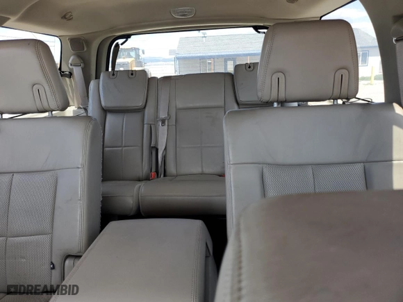 2010 Lincoln Navigator with VIN 5LMJJ2J57AEJ03503, listed as a Copart auction lot 65376814 with 170,597 mi miles and Salvage Title. Bid and sale history available at carsss.com. Image 10.