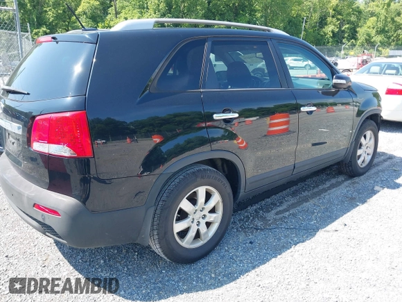 2013 Kia Sorento LX with VIN 5XYKT3A65DG414072, listed as a IAAI auction lot 42602334 with 149,878 mi miles and . Bid and sale history available at DreamBid. Image 4.