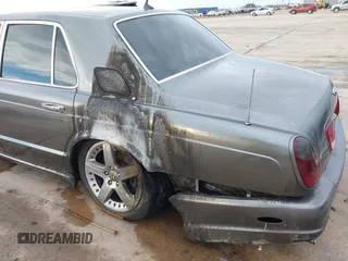 2004 Bentley Arnage with VIN SCBLF34F44CX09842, listed as a IAAI auction lot 41349014 with Not Provided miles and . Bid and sale history available at DreamBid. Image 6.