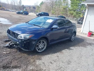 2006 Scion tC with VIN JTKDE177060128395, listed as a IAAI auction lot 41934031 with 181,740 mi miles. Bid and sale history available at carsss.com. Image 2.