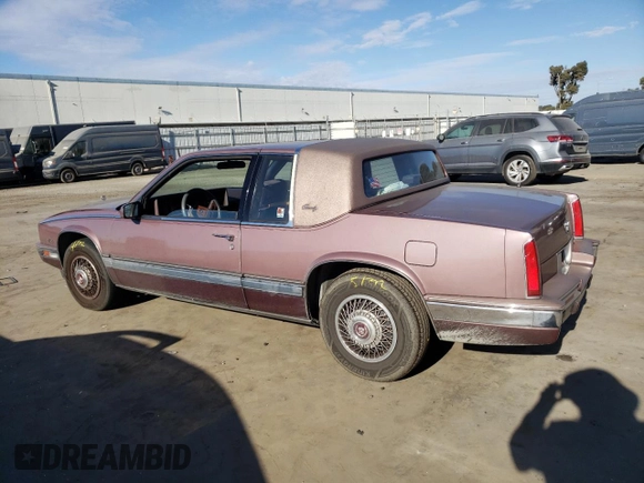 1988 Cadillac Eldorado with VIN 1G6EL1153JU632470, listed as a Copart auction lot 78507684 with 176,894 mi miles and Salvage Title. Bid and sale history available at DreamBid. Image 2.