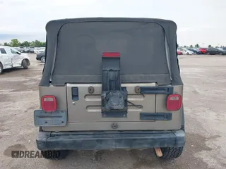 2005 Jeep Wrangler X with VIN 1J4FA39S55P350696, listed as a IAAI auction lot 42367283 with 117,941 mi miles and . Bid and sale history available at DreamBid. Image 16.