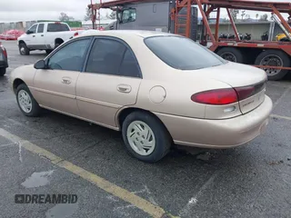 1997 Ford Escort LX with VIN 1FALP13P9VW292877, listed as a IAAI auction lot 41525166 with 91,154 mi miles. Bid and sale history available at carsss.com. Image 3.
