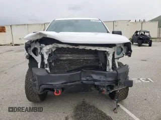 2020 Chevrolet Silverado 1500 Custom Trail Boss with VIN 3GCPYCEF5LG269424, listed as a Copart auction lot 47795493 with 64,297 mi miles and Salvage Title. Bid and sale history available at DreamBid. Image 5.