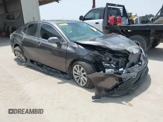 2023 Toyota Camry LE z VIN 4T1R11AK7PU799008, wystawiony jako IAAI lot #41636474 z przebiegiem 30 858 mil mil oraz . Historia ofert i sprzedaży dostępna na DreamBid. Obrazek 1.