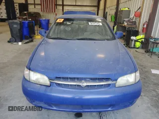 1999 Nissan Altima XE z VIN 1N4DL01D9XC148205, wystawiony jako Copart lot #50392305 z przebiegiem 90 698 mil mil oraz Szkoda całkowita • Salvage title. Historia ofert i sprzedaży dostępna na DreamBid. Obrazek 5.