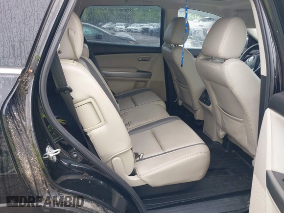 2012 Mazda CX-9 Grand Touring z VIN JM3TB3DV1C0360212, wystawiony jako IAAI lot #42232584 z przebiegiem 99 582 mil mil oraz . Historia ofert i sprzedaży dostępna na DreamBid. Obrazek 8.