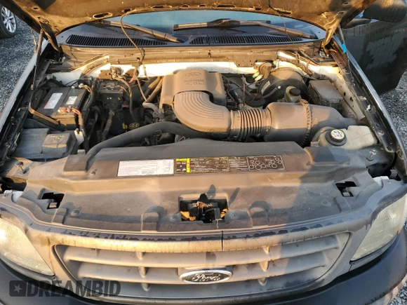 2003 Ford F-150 XL with VIN 1FTRF17W13NA97772, listed as a Copart auction lot 77692074 with Not Provided miles and Salvage Title. Bid and sale history available at DreamBid. Image 11.