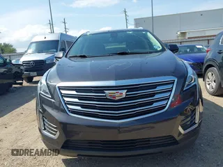 2018 Cadillac XT5 Luxury AWD z VIN 1GYKNDRS0JZ209266, wystawiony jako IAAI lot #42454536 z przebiegiem 52 839 mil mil oraz . Historia ofert i sprzedaży dostępna na DreamBid. Obrazek 12.