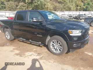 2022 Ram 1500 Laramie with VIN 1C6SRFJT8NN366655, listed as a IAAI auction lot 40564974 with 49,737 mi miles and . Bid and sale history available at DreamBid. Image 1.