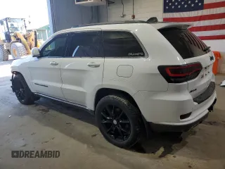 2015 Jeep Grand Cherokee Summit with VIN 1C4RJFJG1FC226591, listed as a Copart auction lot 52926115 with 130,803 mi miles and Salvage Title. Bid and sale history available at DreamBid. Image 2.