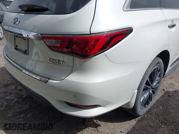 2017 Infiniti QX60 with VIN 5N1DL0MM7HC519011, listed as a IAAI auction lot 41804659 with 118,401 mi miles and . Bid and sale history available at DreamBid. Image 4.