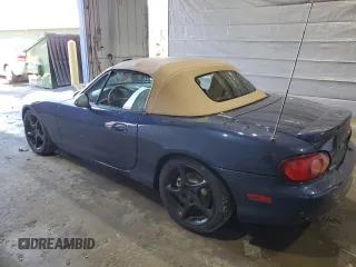 2001 Mazda MX-5 Miata with VIN JM1NB353510209224, listed as a Copart auction lot 51736955 with 103,732 mi miles and Salvage Title. Bid and sale history available at DreamBid. Image 2.