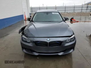 2013 BMW 3 Series 328i xDrive with VIN WBA3B5G50DNS05328, listed as a Copart auction lot 52989285 with 125,516 mi miles and Salvage title. Bid and sale history available at DreamBid. Image 5.