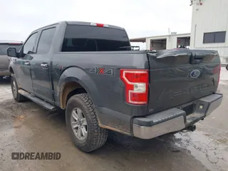 2018 Ford F-150 XL with VIN 1FTEW1E51JKE01917, listed as a IAAI auction lot 41513535 with 112,487 mi miles. Bid and sale history available at carsss.com. Image 3.