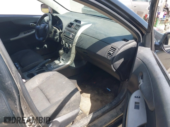 2012 Toyota Corolla L with VIN 2T1BU4EE4CC886407, listed as a IAAI auction lot 42142996 with 216,543 mi miles. Bid and sale history available at carsss.com. Image 5.