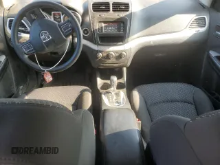 2017 Dodge Journey SXT with VIN 3C4PDDBG8HT525147, listed as a Copart auction lot 63270795 with 169,369 mi miles and Salvage title. Bid and sale history available at DreamBid. Image 8.