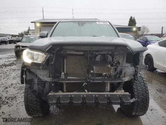 2019 Toyota Tacoma 4WD SR with VIN 3TMCZ5AN3KM256031, listed as a Copart auction lot 86110064 with 144,914 mi miles and Salvage Title. Bid and sale history available at carsss.com. Image 5.