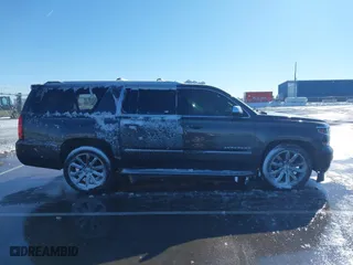 2017 Chevrolet Suburban Premier with VIN 1GNSKJKC0HR274605, listed as a IAAI auction lot 41828392 with 144,747 mi miles. Bid and sale history available at carsss.com. Image 13.
