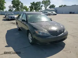 2004 Toyota Camry LE with VIN 4T1BE32K14U318133, listed as a Copart auction lot 54238185 with 293,761 mi miles and Salvage Title. Bid and sale history available at carsss.com. Image 13.