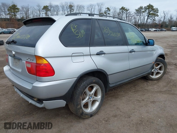 2001 BMW X5 3.0i with VIN WBAFA53571LM67411, listed as a IAAI auction lot 41727600 with 999,999 mi miles. Bid and sale history available at carsss.com. Image 4.