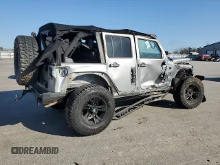 2015 Jeep Wrangler Unlimited Wrangler X with VIN 1C4BJWEG7FL580885, listed as a Copart auction lot 48891605 with 104,448 mi miles and Salvage title. Bid and sale history available at DreamBid. Image 3.