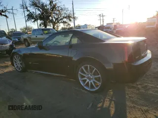 2006 Cadillac XLR z VIN 1G6YX36D965602114, wystawiony jako Copart lot #80151794 z przebiegiem Nie podano mil oraz Szkody całkowita. Historia ofert i sprzedaży dostępna na DreamBid. Obrazek 2.