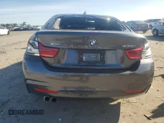 2019 BMW 4 Series 430i xDrive z VIN WBA4J3C59KBL05590, wystawiony jako Copart lot #57723065 z przebiegiem Nie podano mil oraz Szkoda całkowita • Salvage title. Historia ofert i sprzedaży dostępna na DreamBid. Obrazek 6.