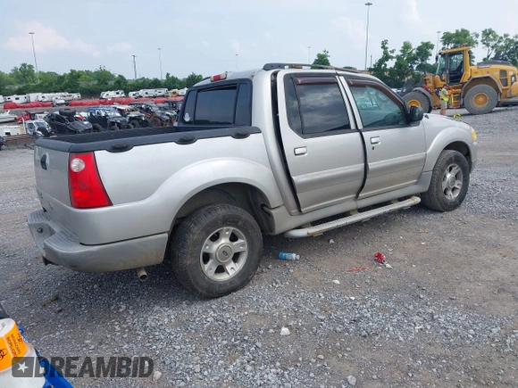 2003 Ford Explorer Sport Trac XLS z VIN 1FMZU77E73UB97392, wystawiony jako IAAI lot #42400398 z przebiegiem 160 556 mil mil oraz . Historia ofert i sprzedaży dostępna na DreamBid. Obrazek 4.