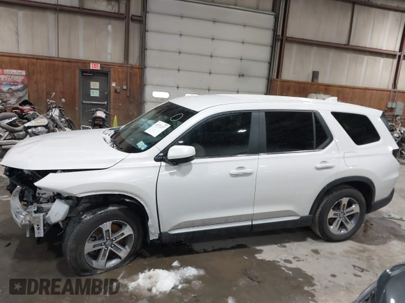 2025 Honda Pilot EX-L with VIN 5FNYG1H41SB045061, listed as a IAAI auction lot 41571217 with 7,971 mi miles and . Bid and sale history available at DreamBid. Image 14.