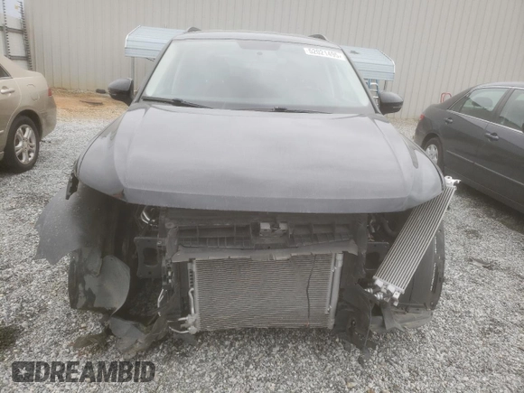 2022 Volkswagen Tiguan S with VIN 3VV0B7AX3NM076297, listed as a Copart auction lot 52021495 with 30,212 mi miles and Salvage title. Bid and sale history available at DreamBid. Image 5.