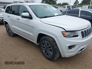 2014 Jeep Grand Cherokee Overland with VIN 1C4RJECG4EC543092, listed as a IAAI auction lot 40981315 with 149,096 mi miles. Bid and sale history available at carsss.com. Image 1.